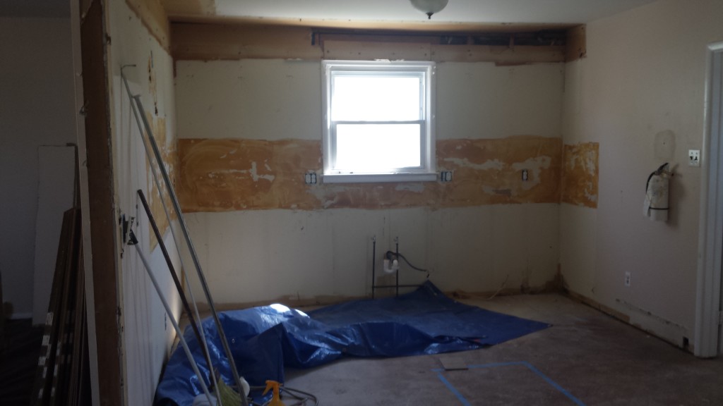 In case you can't tell, the backsplash left a mess of glue and the drywall stops 6" from the ceiling.