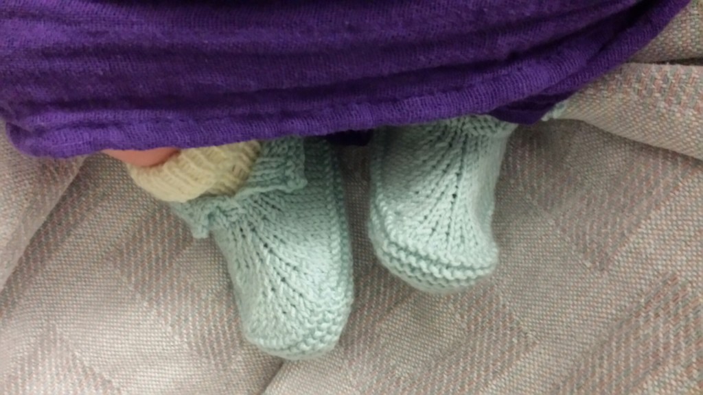 Baby feet in baby booties