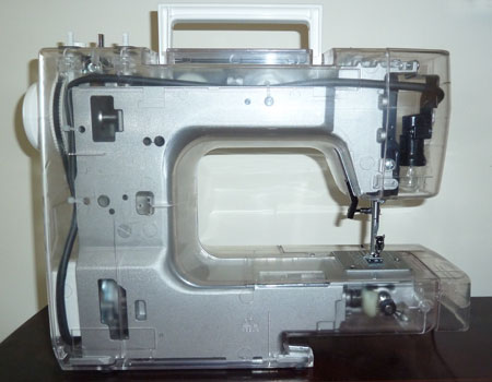 A Janome JR1012 in a clear plastic case so you can see the metal frame inside